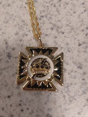 Gold and Black Enamel Sunburst Pendant Necklace